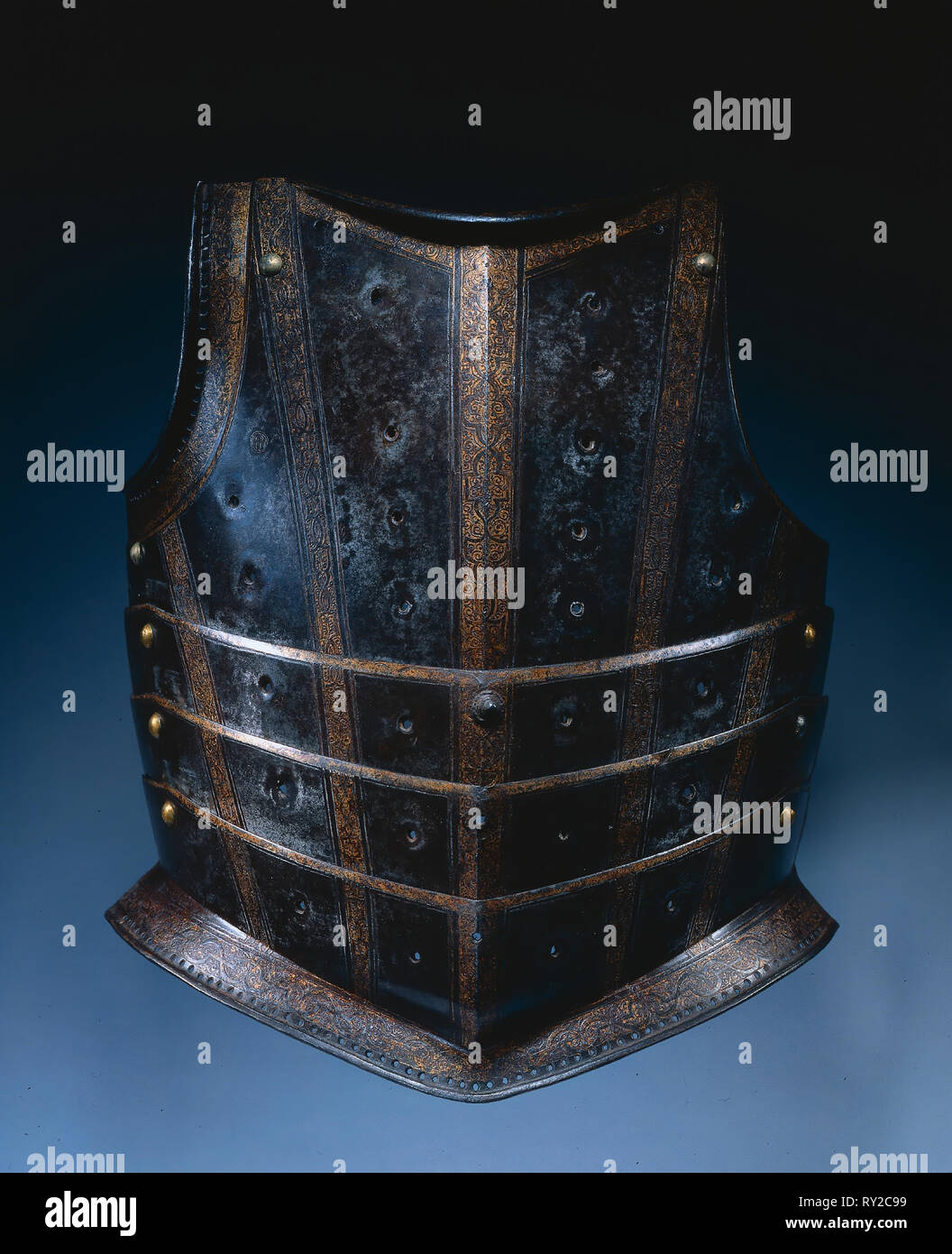 Breastplate from Hussar's Cuirass, c. 1580. Germany, Augsburg or Hungary, 16th century. Steel (originally blued, now russet), etched and gilded strapwork bands; ; overall: 42.3 x 35 cm (16 5/8 x 13 3/4 in Stock Photo