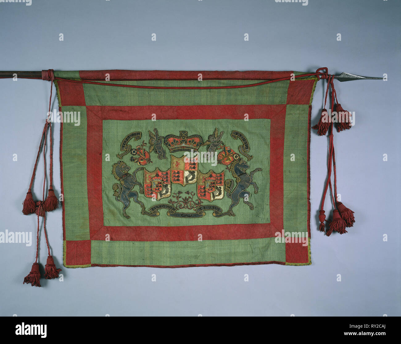 Banner with Royal Coat of Arms of Great Britain, 1700s. Great Britain, probably England, 18th century. Green silk ground with embroidery; crimson cords and tassels; overall: 127 x 118.1 cm (50 x 46 1/2 in Stock Photo