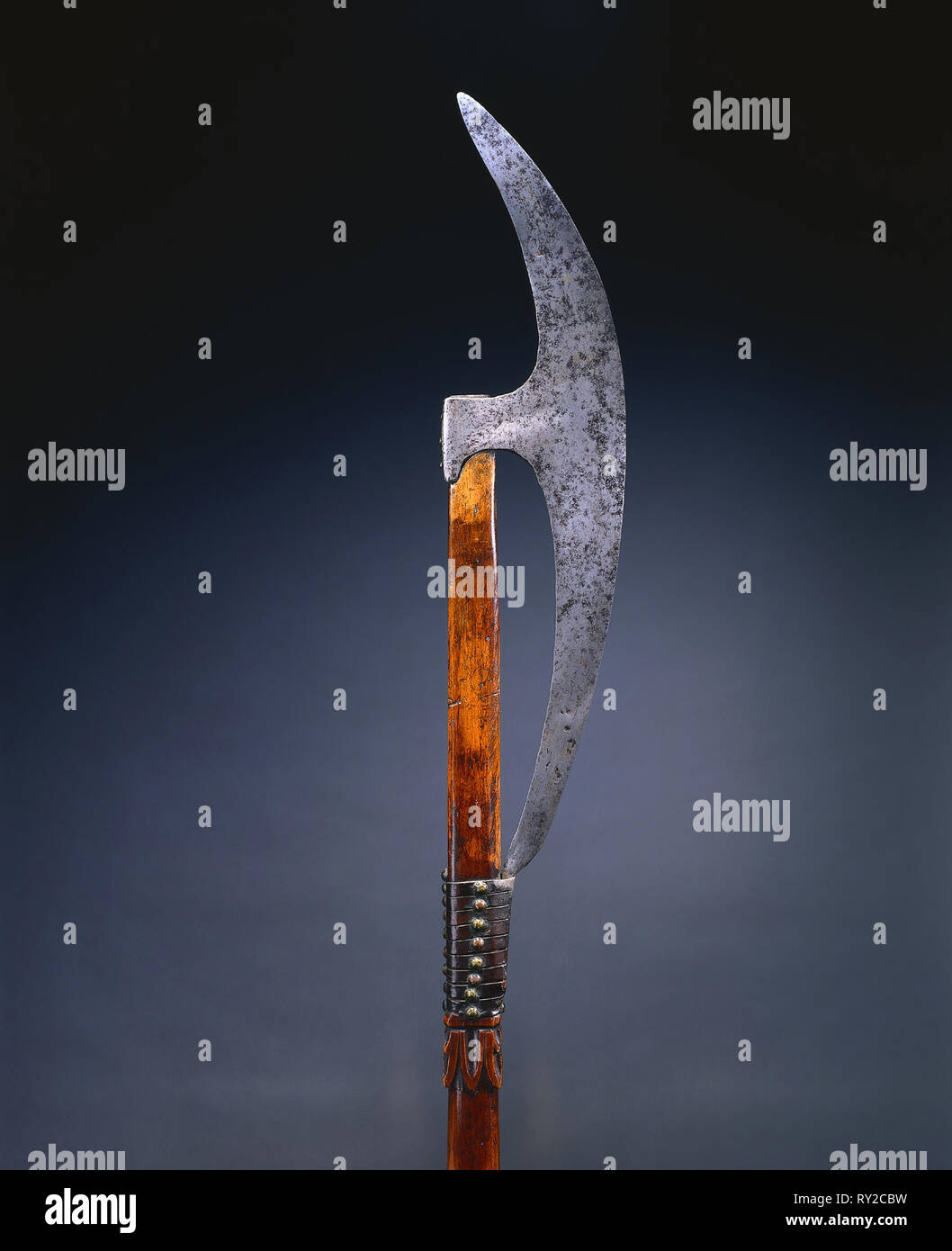 Bardiche (Pole Axe), 1500s. Germany or Russia, 16th century. Steel, leather, brass; wood haft; overall: 178.5 cm (70 1/4 in.); blade: 14.2 cm (5 9/16 in Stock Photo