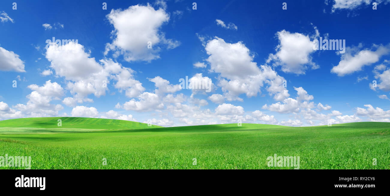 Green Rolling Hills Blue Sky Sun High Resolution Stock Photography And Images Alamy