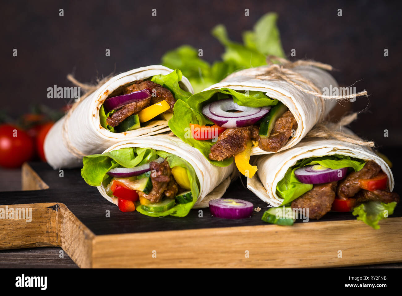 Burritos tortilla wraps with beef and vegetables Stock Photo Alamy