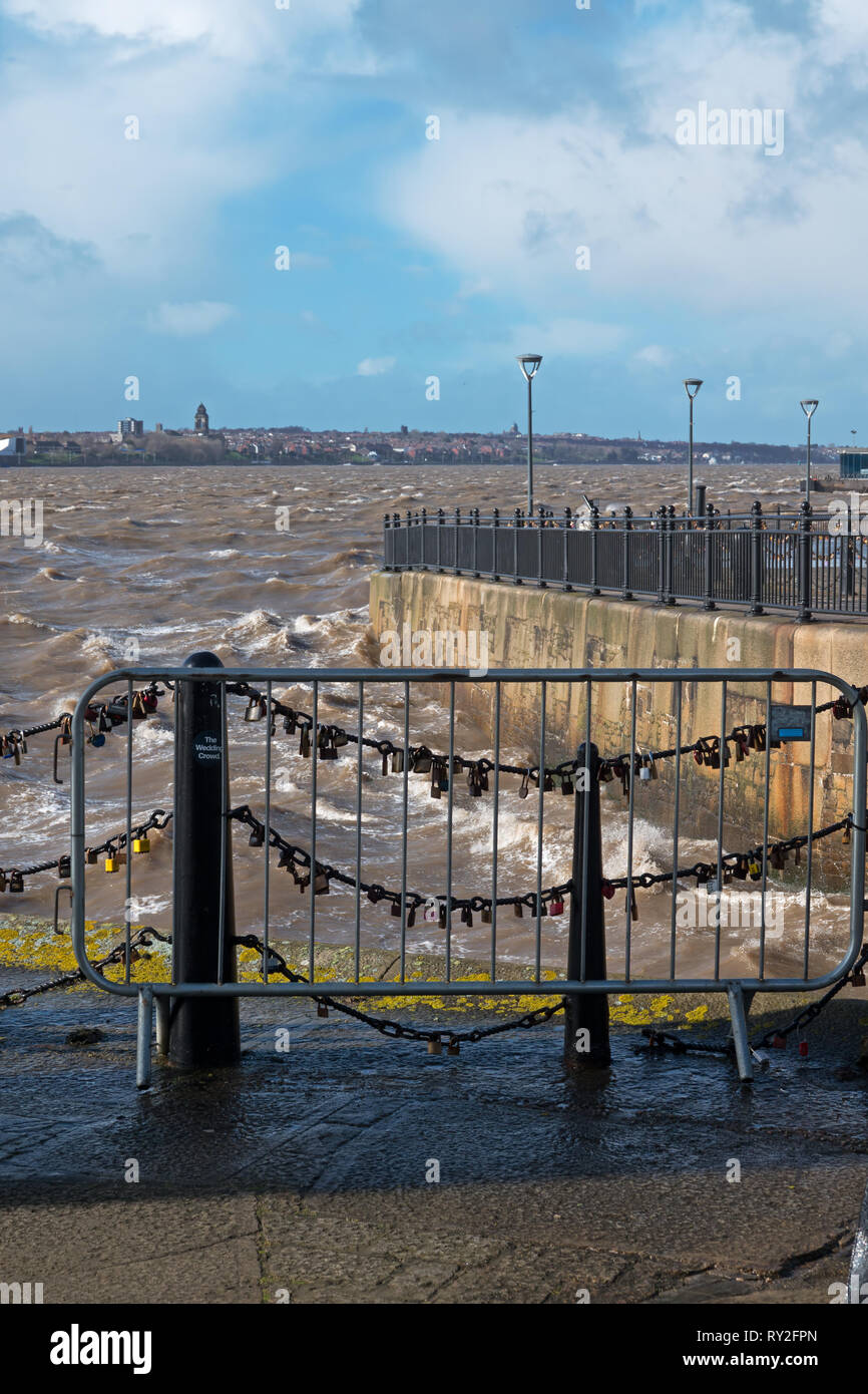 High tide on the River Mersey at the Albert Dock on a stormy day. Stock Photo