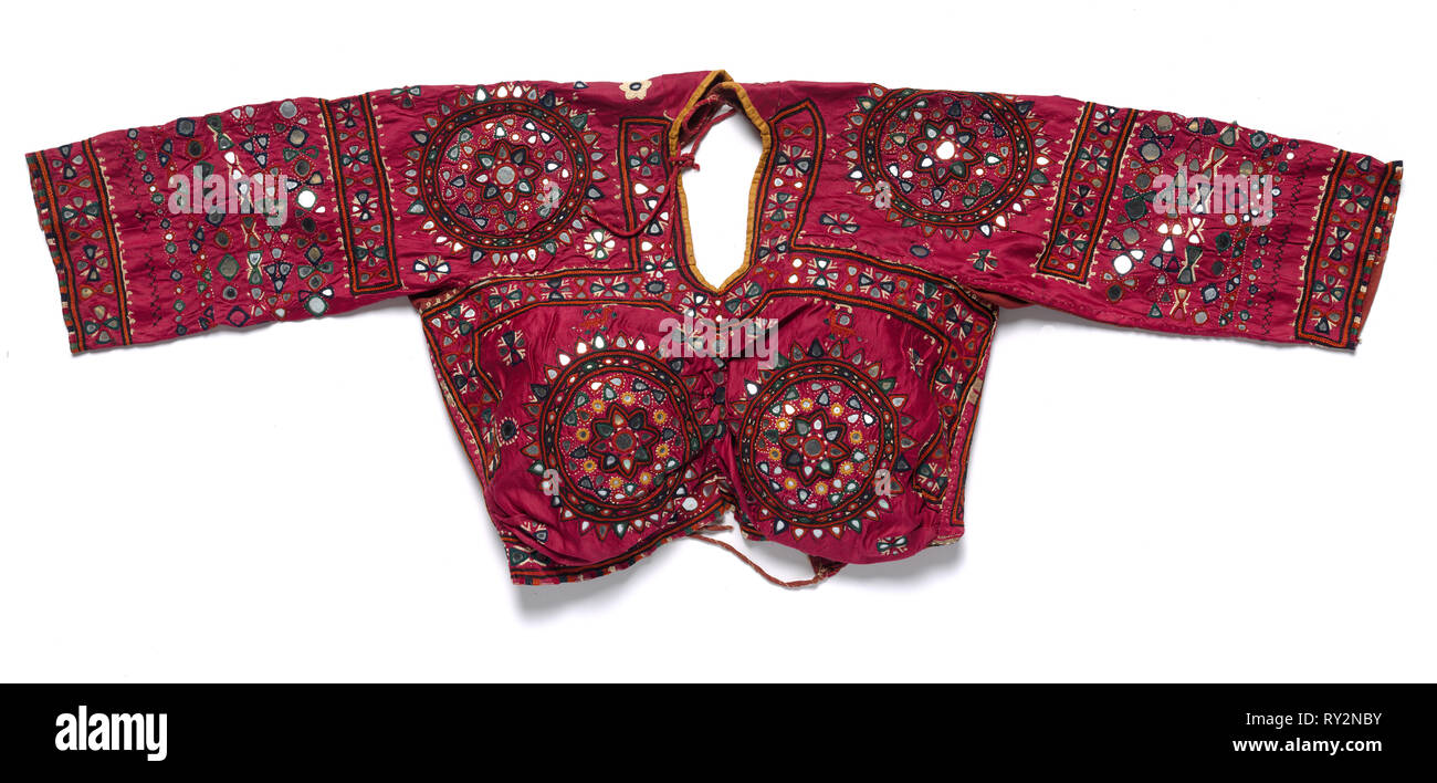 Bodice or Choli, 1800s. India, Cutch or Sind, 19th century. Embroidery; silk on silk satin with mirror-glass inserts; overall: 33 x 91.4 cm (13 x 36 in Stock Photo