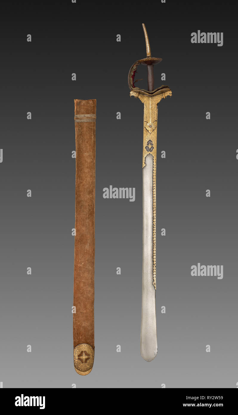 Sword with scabbard, 1700s-1800s. India, perhaps Deccan, 18th-19th century AD. Watered steel blade with iron hilt inlaid with gold; velvet lining with leather straps; wooden scabbard with velvet case and metallic threads; overall: 99 cm (39 in Stock Photo