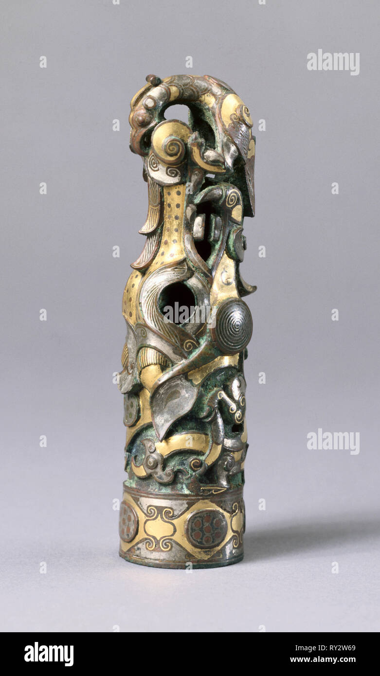 Finial, 475-221 BC. China, Henan province, Jincun, Warring States period (475-221 BC). Bronze inlaid with gold and silver; overall: 13.1 cm (5 3/16 in Stock Photo