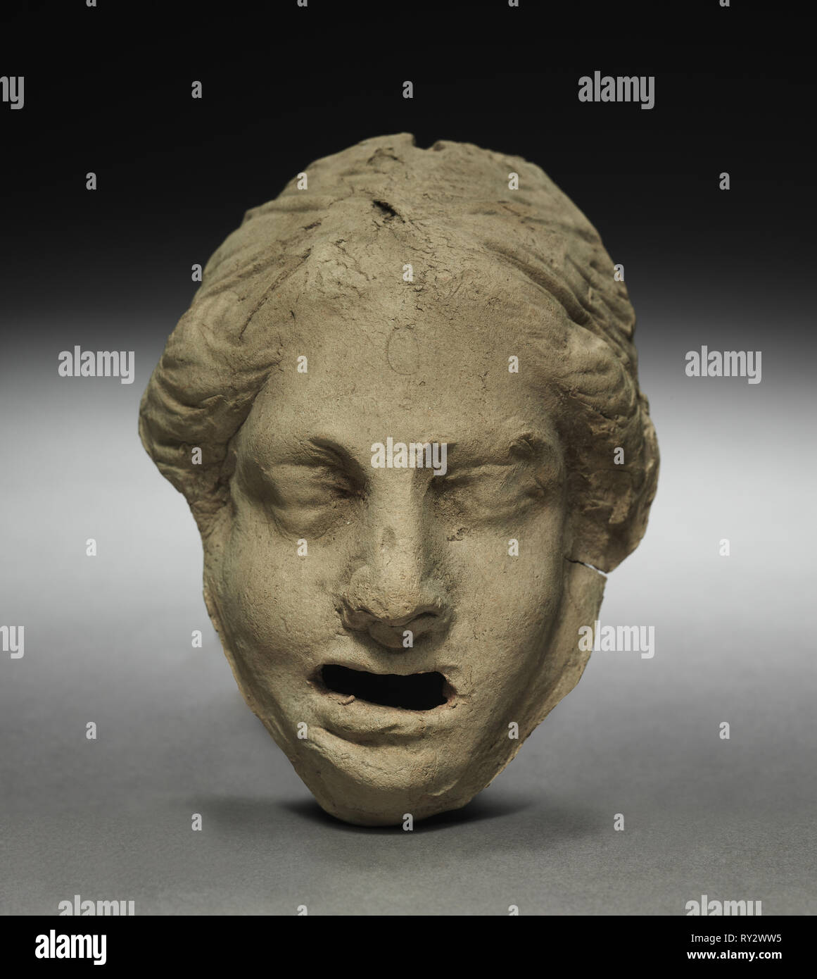 Head of a Weeping Woman, 1-200. Parthian, 1st-2nd Century. Terracotta; overall: 11.6 cm (4 9/16 in Stock Photo