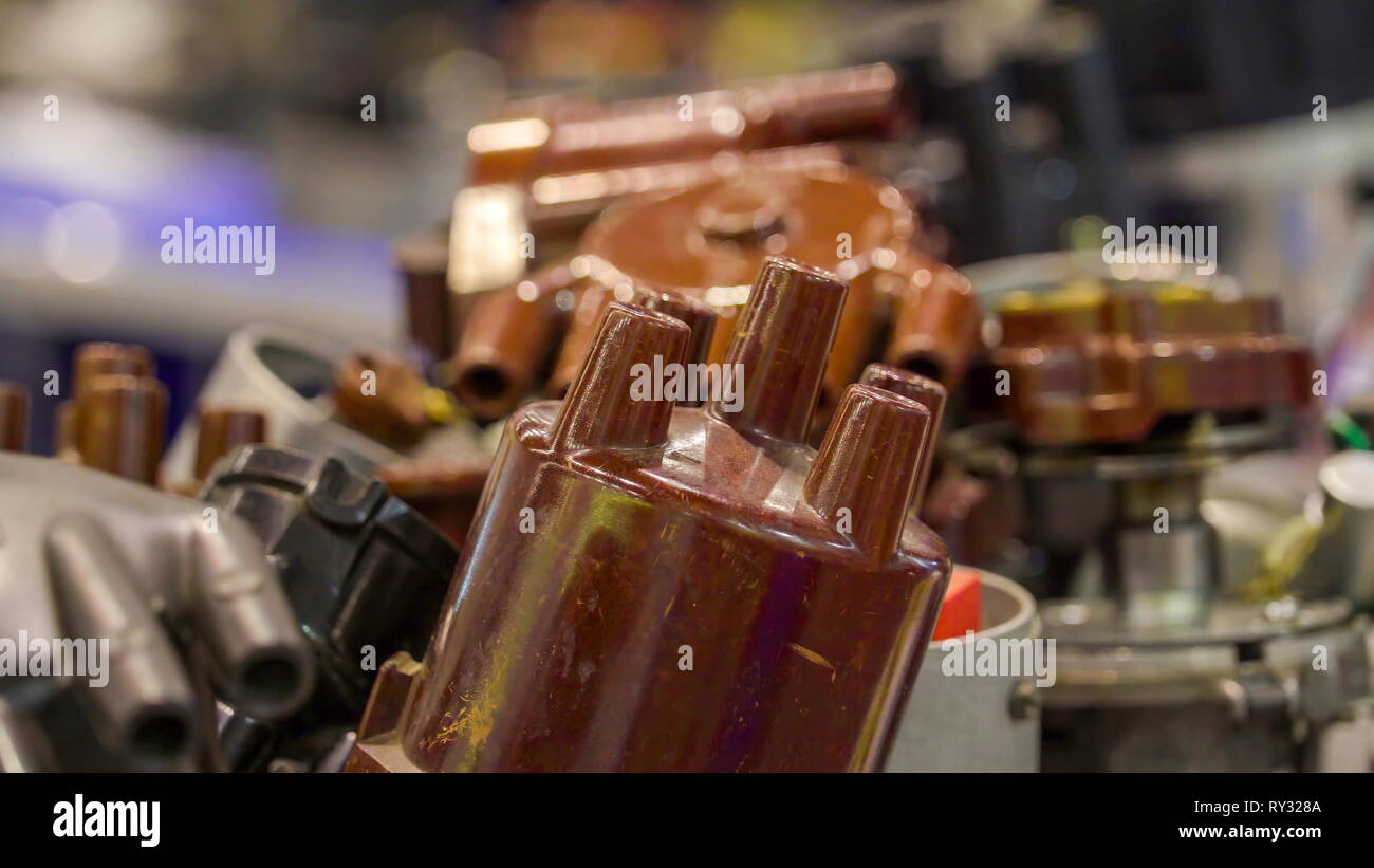 Some of the old car parts of the engine seen closely inside some metal parts of it in Italy