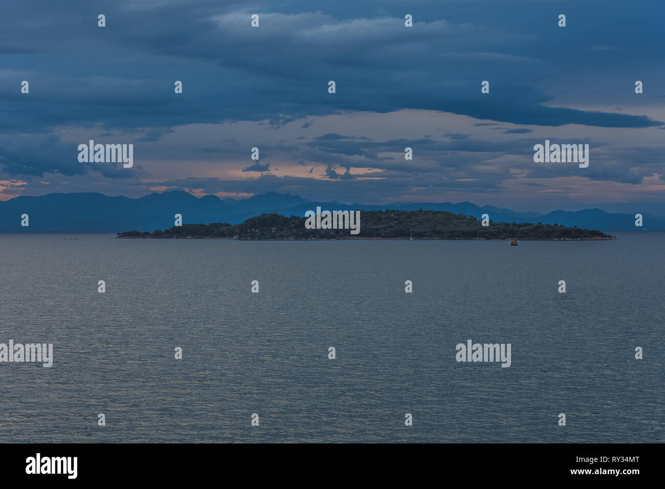 Panorama of the island of Vidos near Corfu on a rainy day, Greece Stock Photo