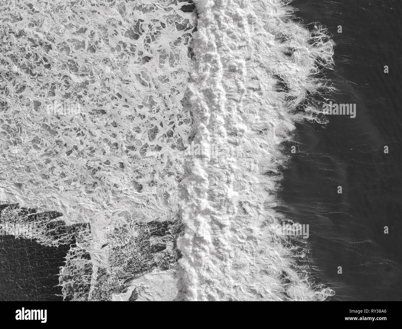 Aerial top view of ocean wave with foam. Drone Photo Stock Photo - Alamy