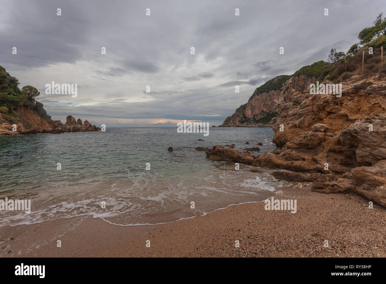 Paleokastritsa bay on a rainy day, Corfu Island, Greece Stock Photo