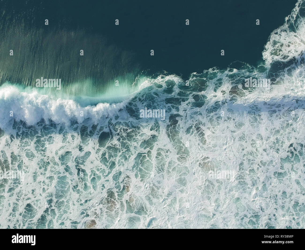 Aerial top view of ocean wave with foam. Drone Photo Stock Photo - Alamy