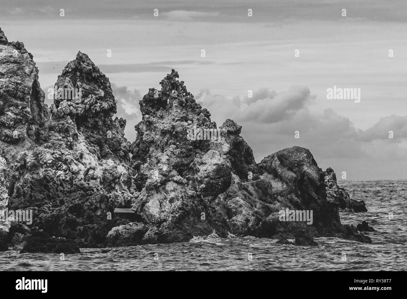 Rocks of bizarre shapes in Paleokastritsa bay black and white effect, Corfu Island, Greece Stock Photo