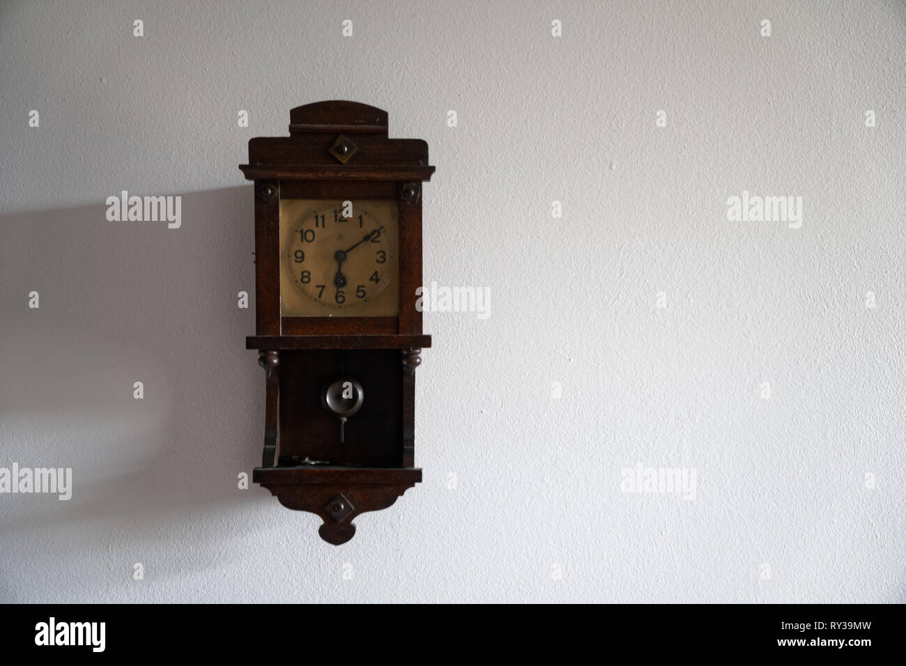 Classic wall clock pendulum hi-res stock photography and images - Alamy