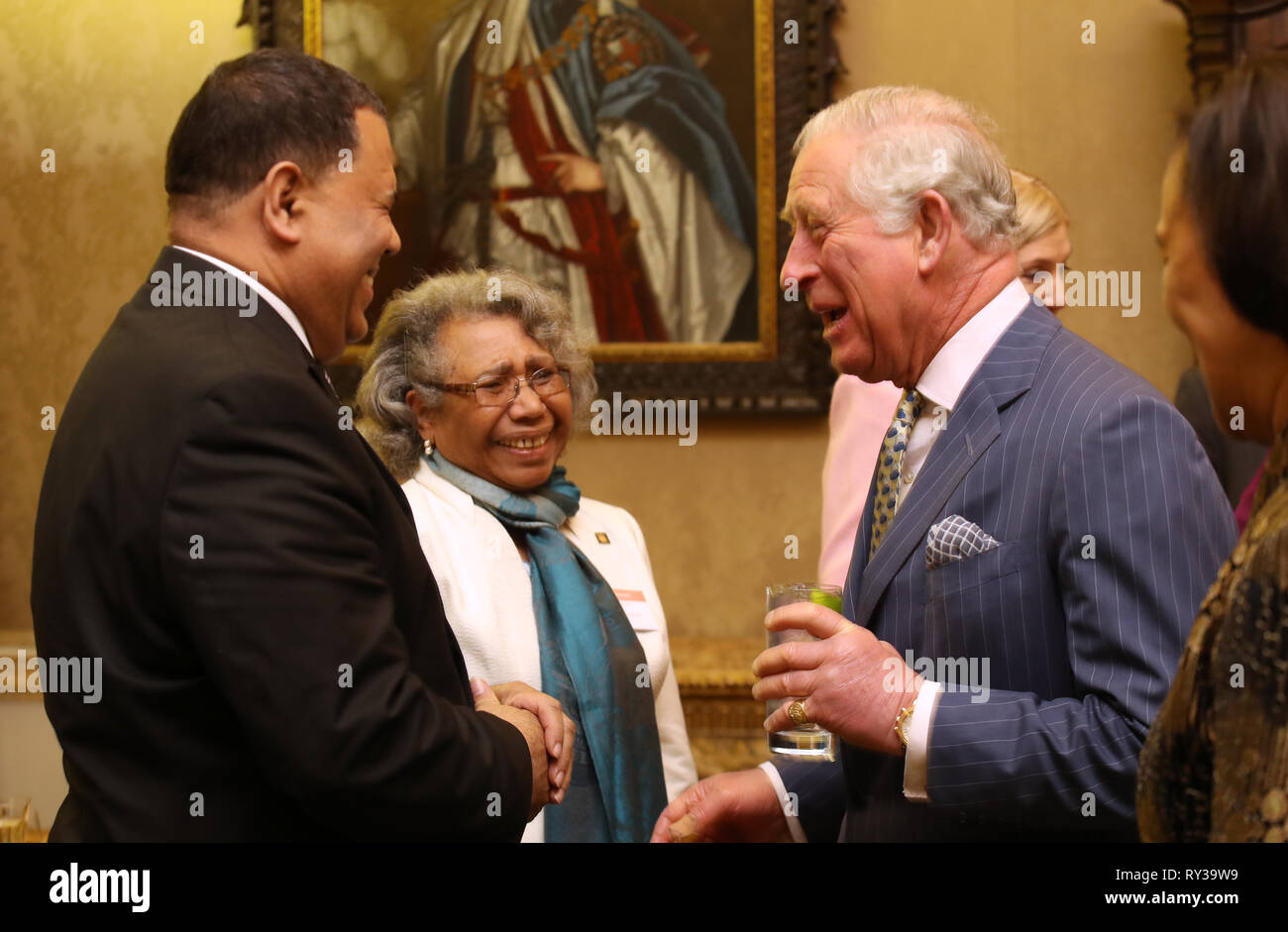 Prince of Wales (right) speaks with guests at the annual Commonwealth Day reception at Marlborough House, the home of the Commonwealth Secretariat in London. Stock Photo