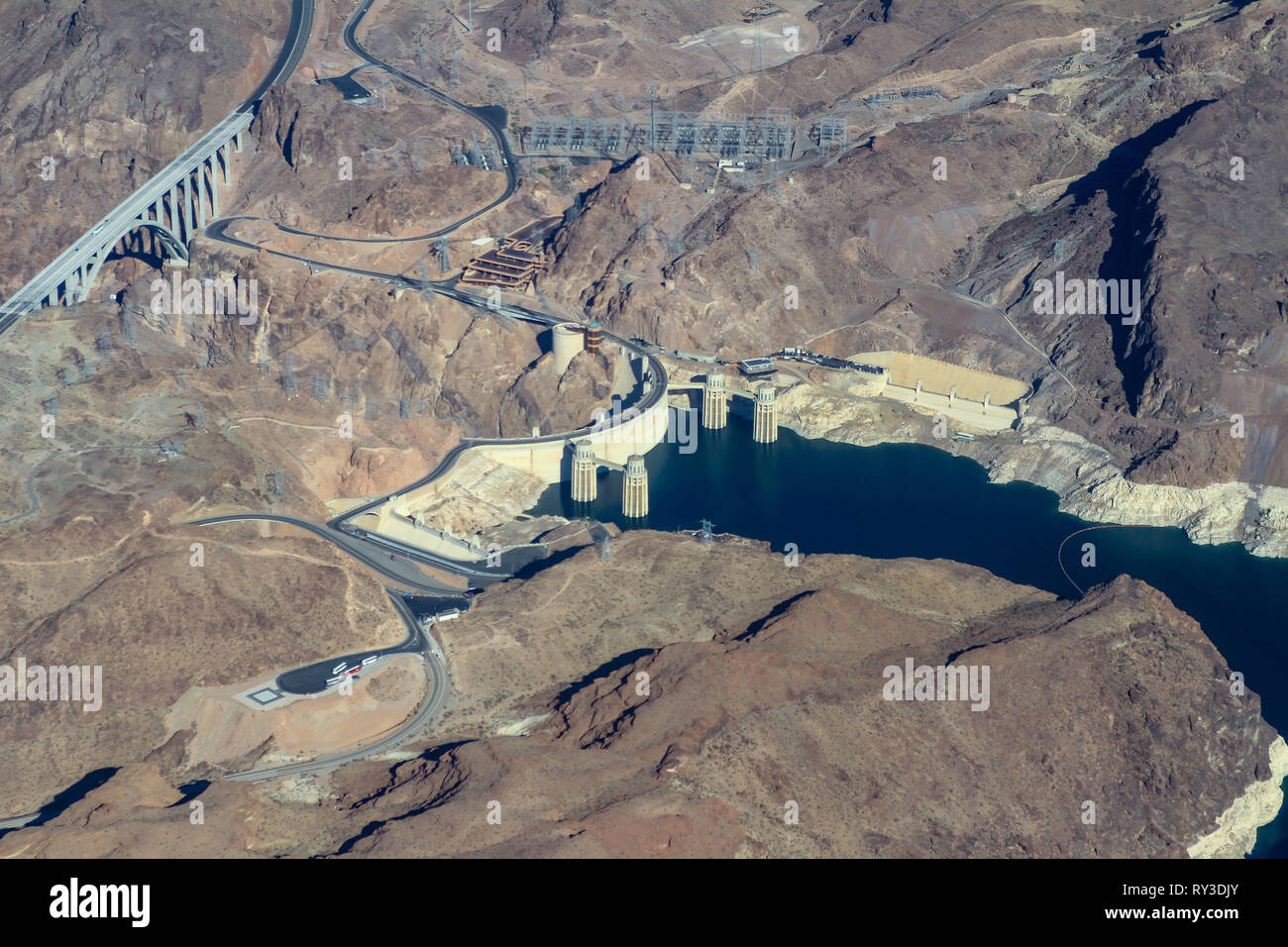 Aerial view of the Black Canyon and Hoover Dam on the Colorado River between Nevada and Arizona, USA shot from a plane window Stock Photo