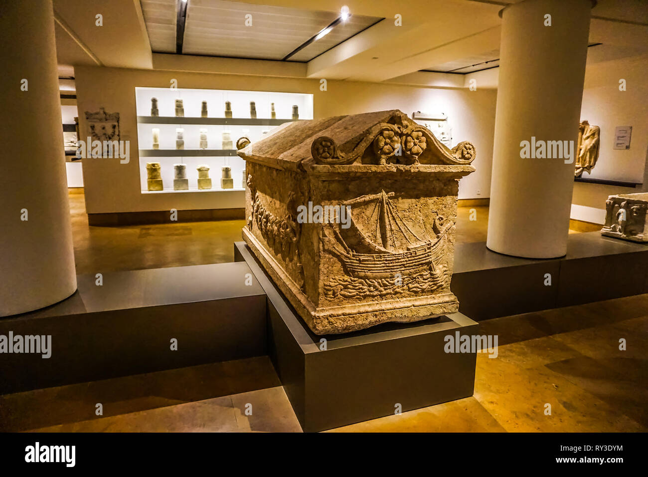 Beirut National Archeological Artifacts Museum Stone Coffin with Ship Carvings Stock Photo