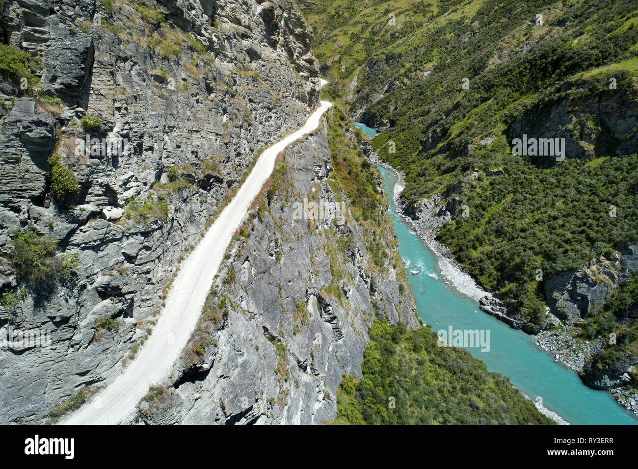 Road into Skippers Canyon, and Shotover River, near Queenstown, South Island, New Zealand - aerial Stock Photo