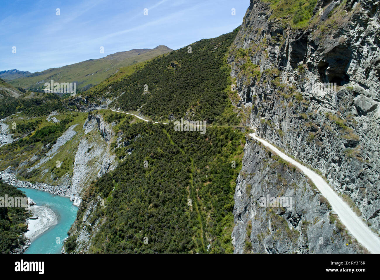 Road into Skippers Canyon, and Shotover River, near Queenstown, South Island, New Zealand - aerial Stock Photo