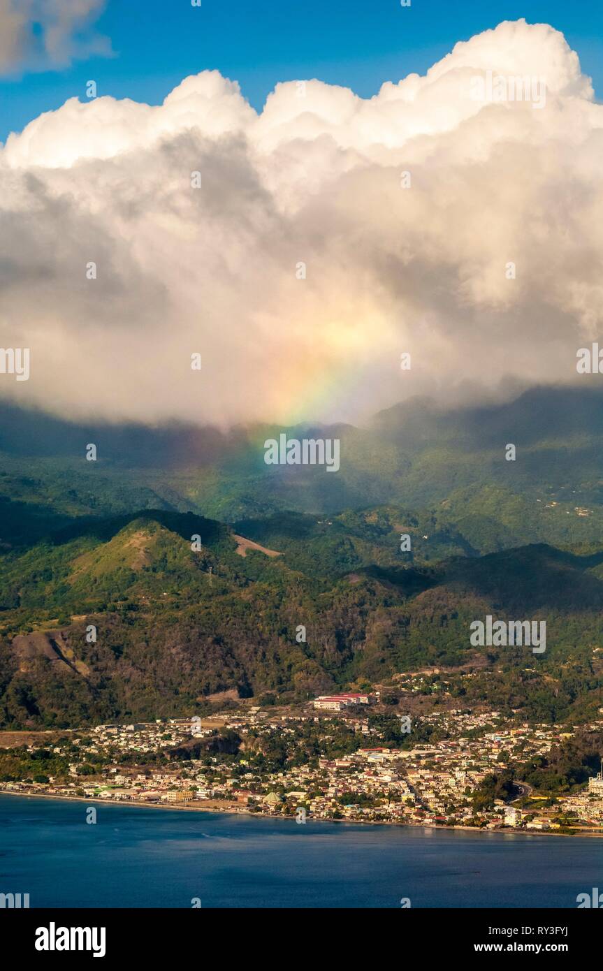 Dominica, aerial view of the capital Roseau, under a rainbow Stock