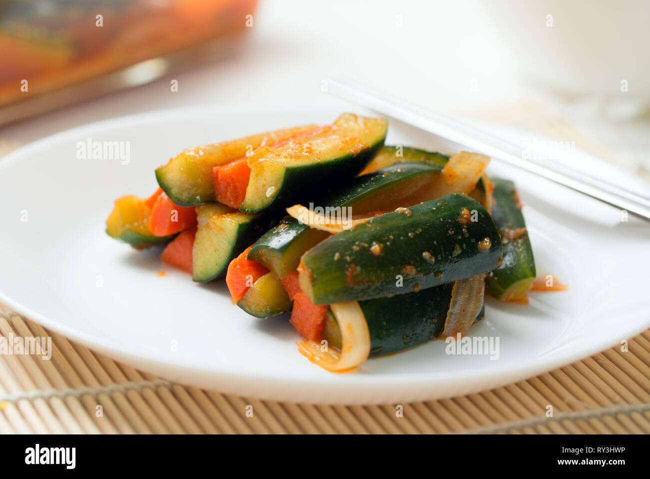 Korea style kimchi pickled cucumbers with carrots salad Stock Photo