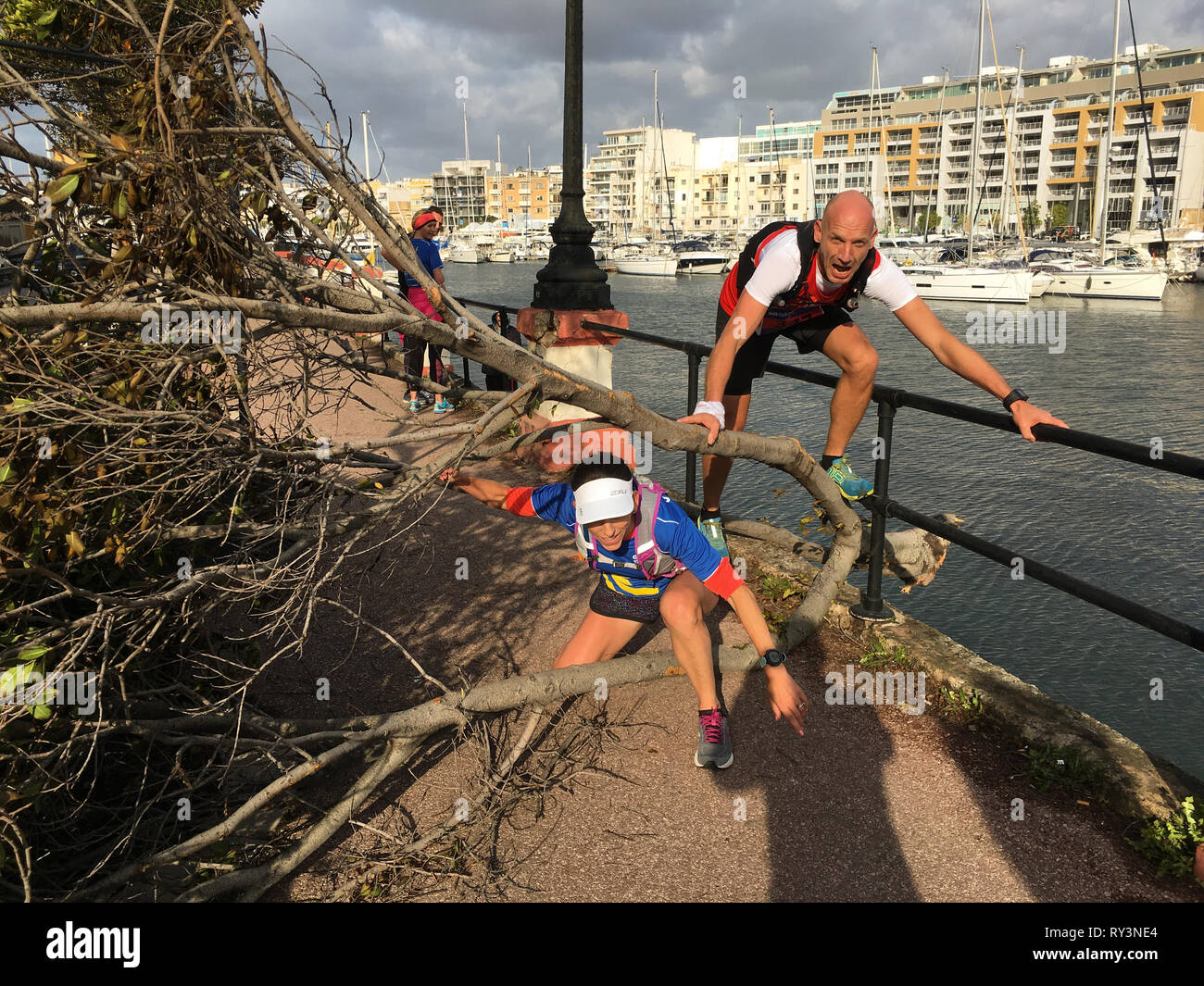 Runners gather for a social run go running in day after cancelled Malta Marathon in St Julians and Valletta Malta 25 February 2019 Stock Photo Alamy
