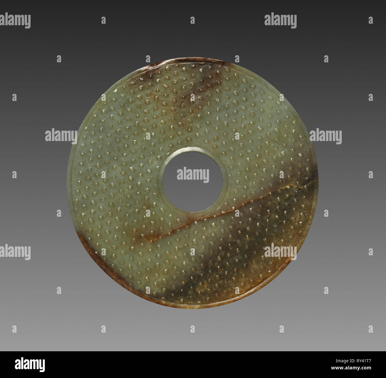 Ceremonial Disk with Grain Pattern (Bi), 475-221 BC. China, Warring States period (475-221 BC). Jade (nephrite); diameter: 18.4 cm (7 1/4 in Stock Photo