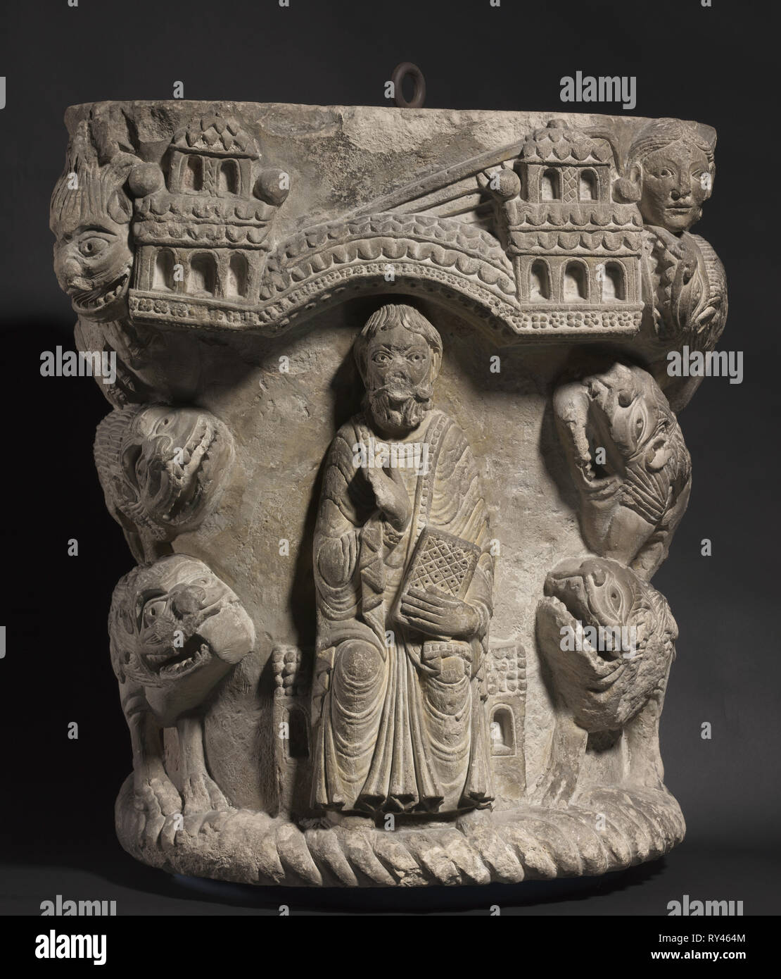 Daniel in the Lion's Den, c. 1125-1150. France, Saint-Aignan-sur-Cher, 12th century. Limestone; overall: 72.4 x 68.6 x 36.2 cm (28 1/2 x 27 x 14 1/4 in Stock Photo