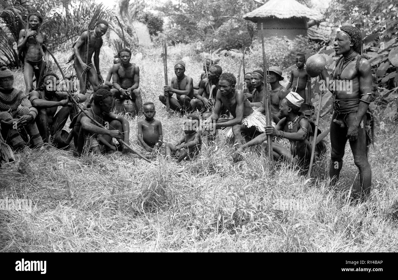 African native tribesmen warriors and children 1950 Stock Photo