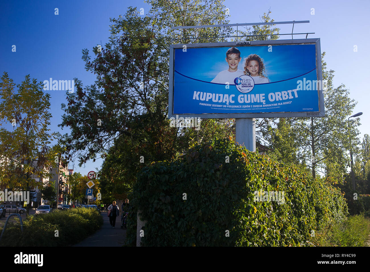 Big billboard on the corner of a street is advertising Orbit Chewing Gum,  with blue sky on a sunny day Stock Photo - Alamy
