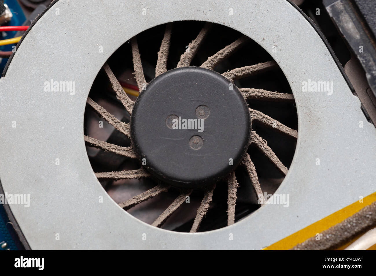 cpu cooler system with dust and web. laptop computer motherboard dust