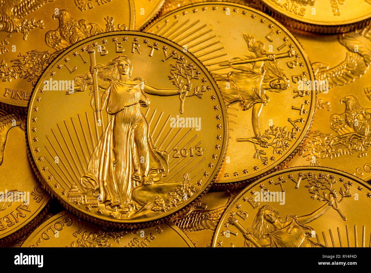 Pile of US Treasury Gold Eagle one ounce coins Stock Photo - Alamy