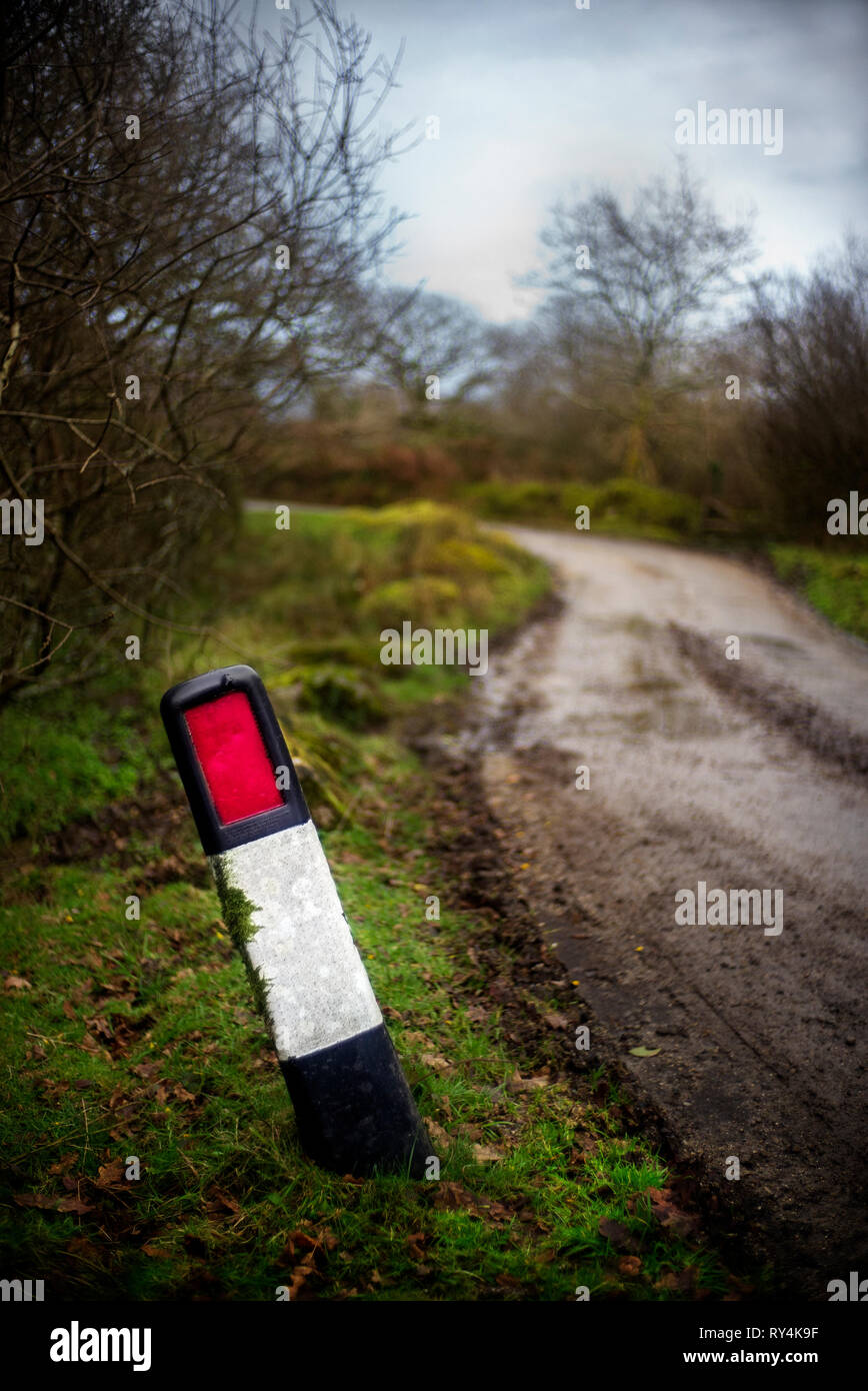roadside road edge marker a reflective post on moorland country lane