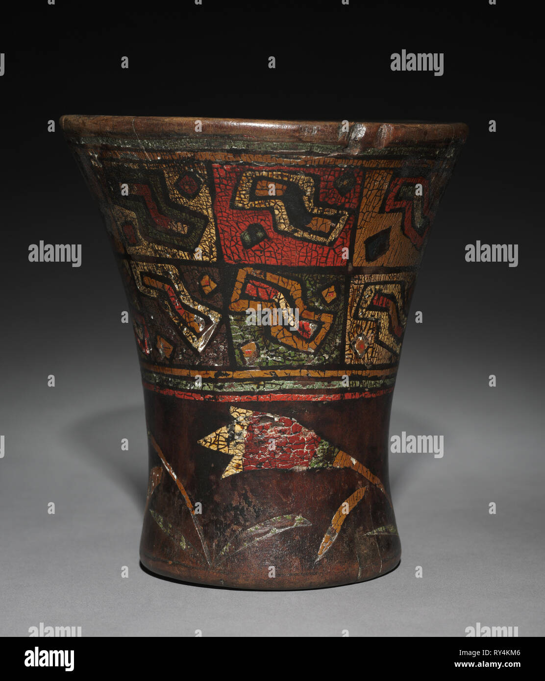 Kero (Waisted Cup), after 1550. Peru, Colonial Inka style, 16th century. Wood, inlaid pigments; diameter of mouth: 17.8 x 16 cm (7 x 6 5/16 in.); overall: 17.8 cm (7 in Stock Photo