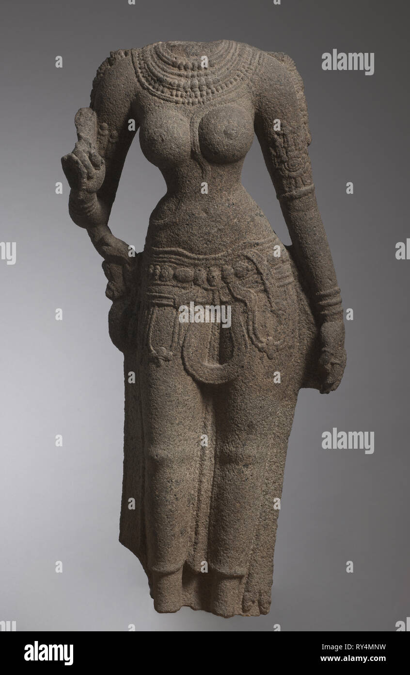 (Parvati) Devi, 1000s. South India, Chola period (900-13th century). Granite; overall: 116.8 x 48.3 x 25.4 cm (46 x 19 x 10 in Stock Photo
