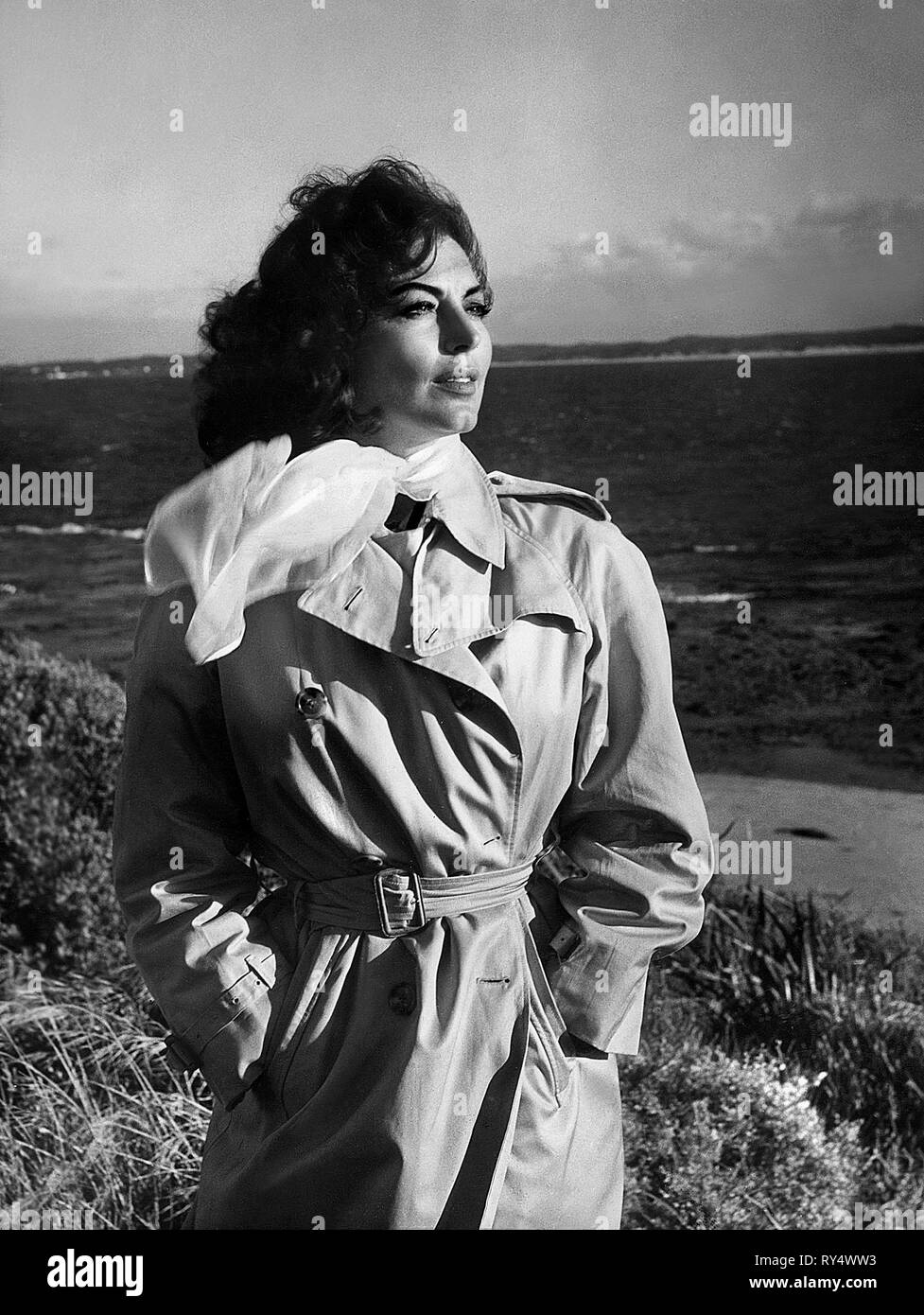 AVA GARDNER, ON THE BEACH, 1959 Stock Photo