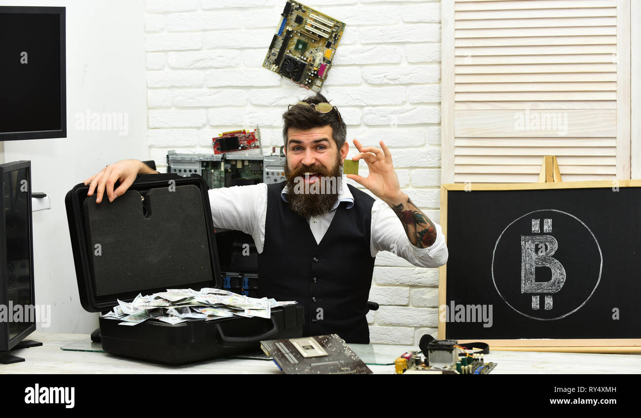 Successful crypto investor. Business man in server room. Bearded hipster with  bitcoin symbol and dollars. From paper money to crypto currency. Bitcoin  Stock Photo - Alamy
