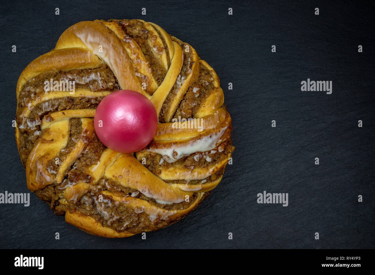 Easter baking. Easter wreath. A wreath with an easter egg in the middle Stock Photo
