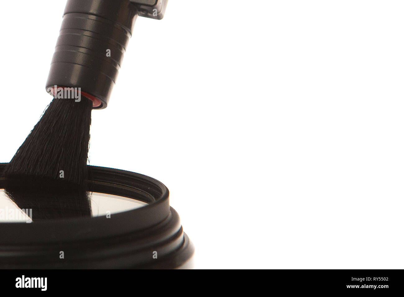 Modern camera Lens cleaning with brush close up view Stock Photo Alamy