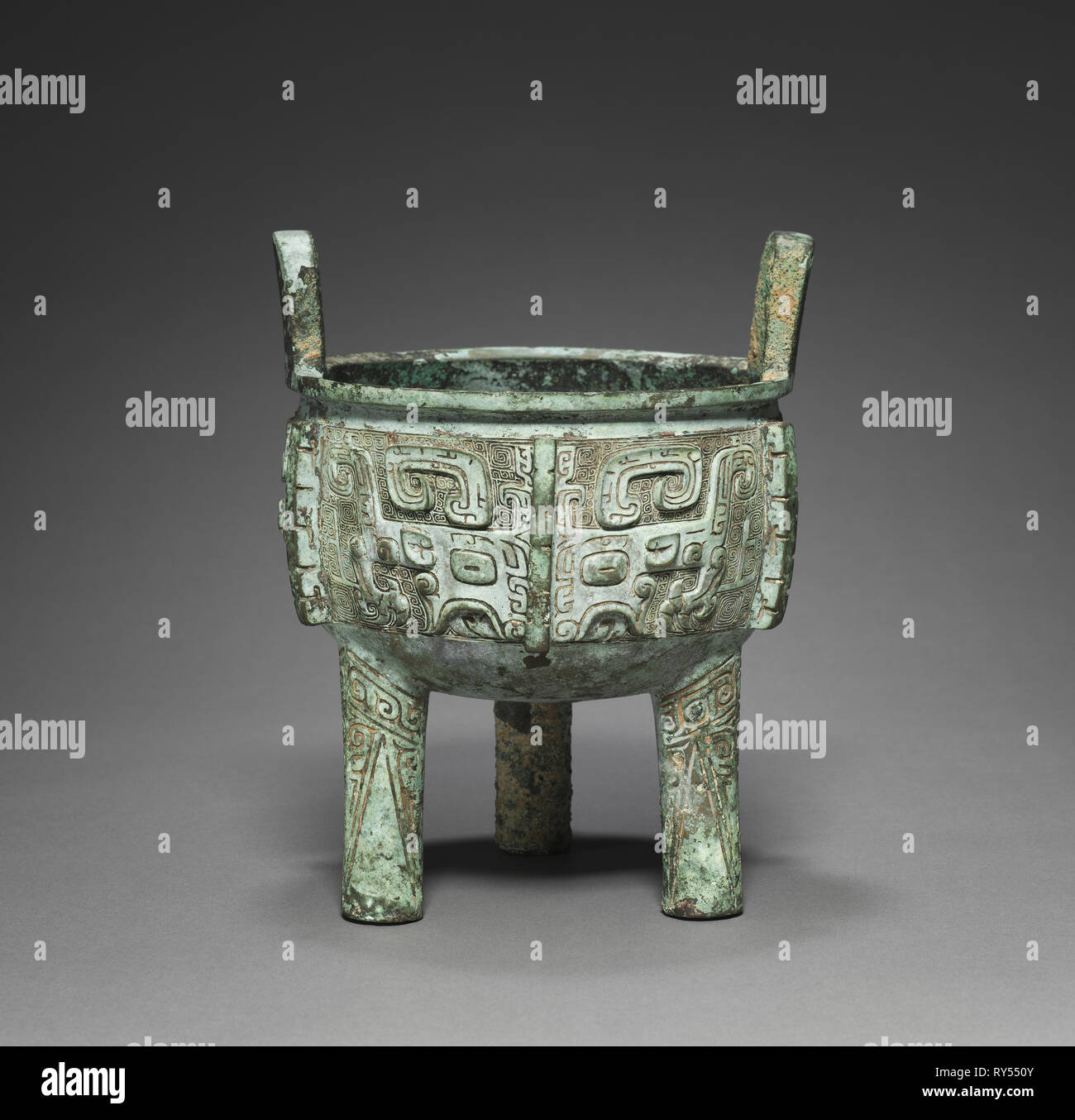 Tripod (Ding), c. 1250-1046 BC. China, late Shang dynasty (c.1600-c.1046 BC), Anyang phase (c.1250-1046 BC). Bronze; overall: 24.5 x 20 cm (9 5/8 x 7 7/8 in Stock Photo