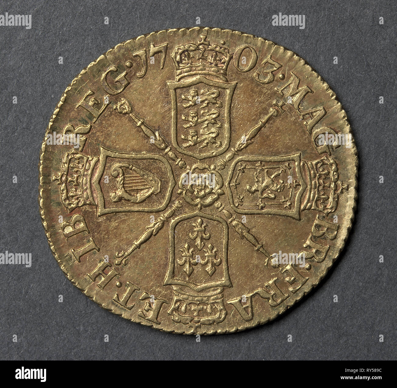 Half Guinea (reverse), 1703. England, Anne, 1702-1714. Gold Stock Photo