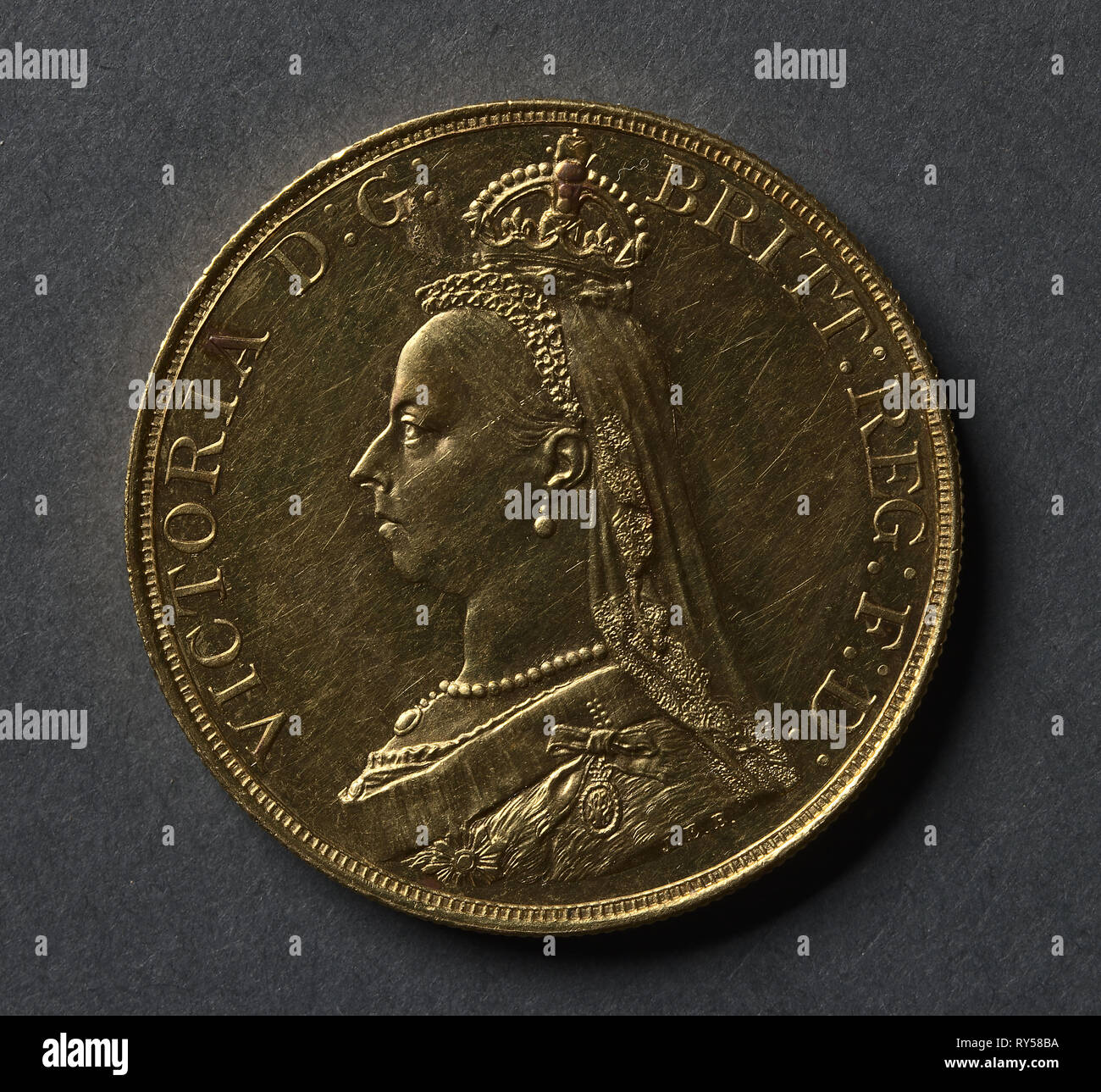 Five Pounds (obverse), 1887. Joseph Boehm (British, 1834-1890). Gold Stock Photo