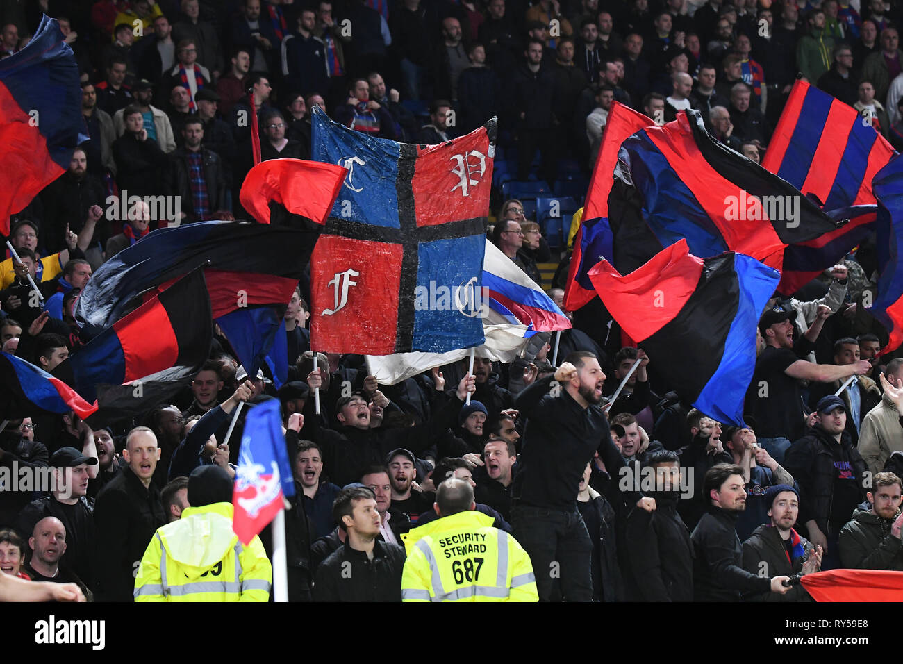 LONDON, ENGLAND - FEBRUARY 27, 2019: Palace ultras pictured during the 2018/19 Premier League game between Crystal Palace FC and Manchester United at Selhurst Park. Stock Photo