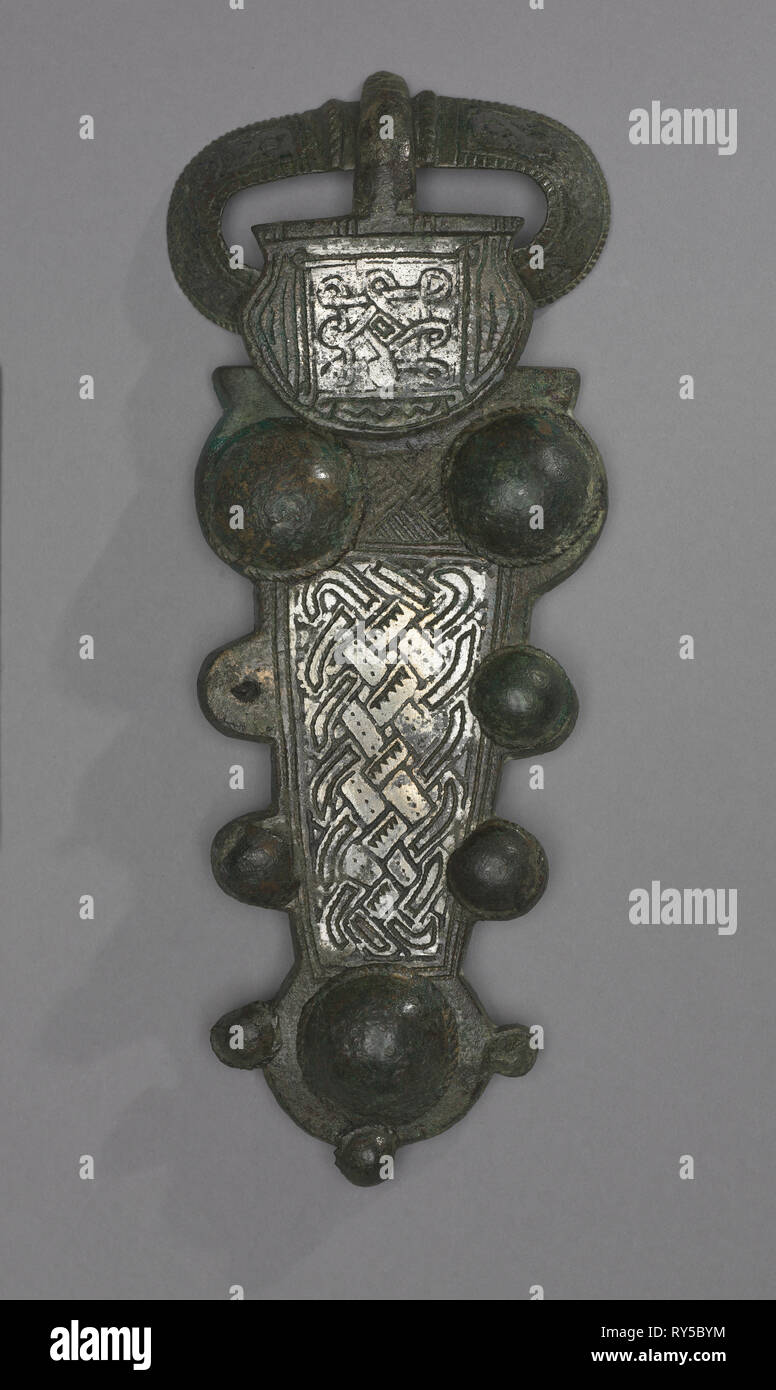 Buckle, 600s. Frankish, Migration period, 7th century. Bronze and silver overlay; overall: 18.6 cm (7 5/16 in Stock Photo
