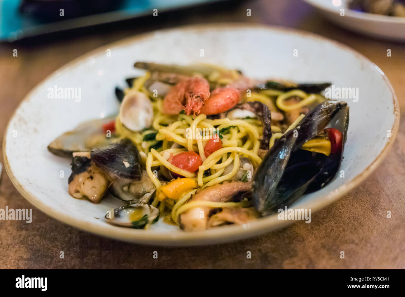 Traditional maltese seafood mix spaghetti with calamari, giant shrimps