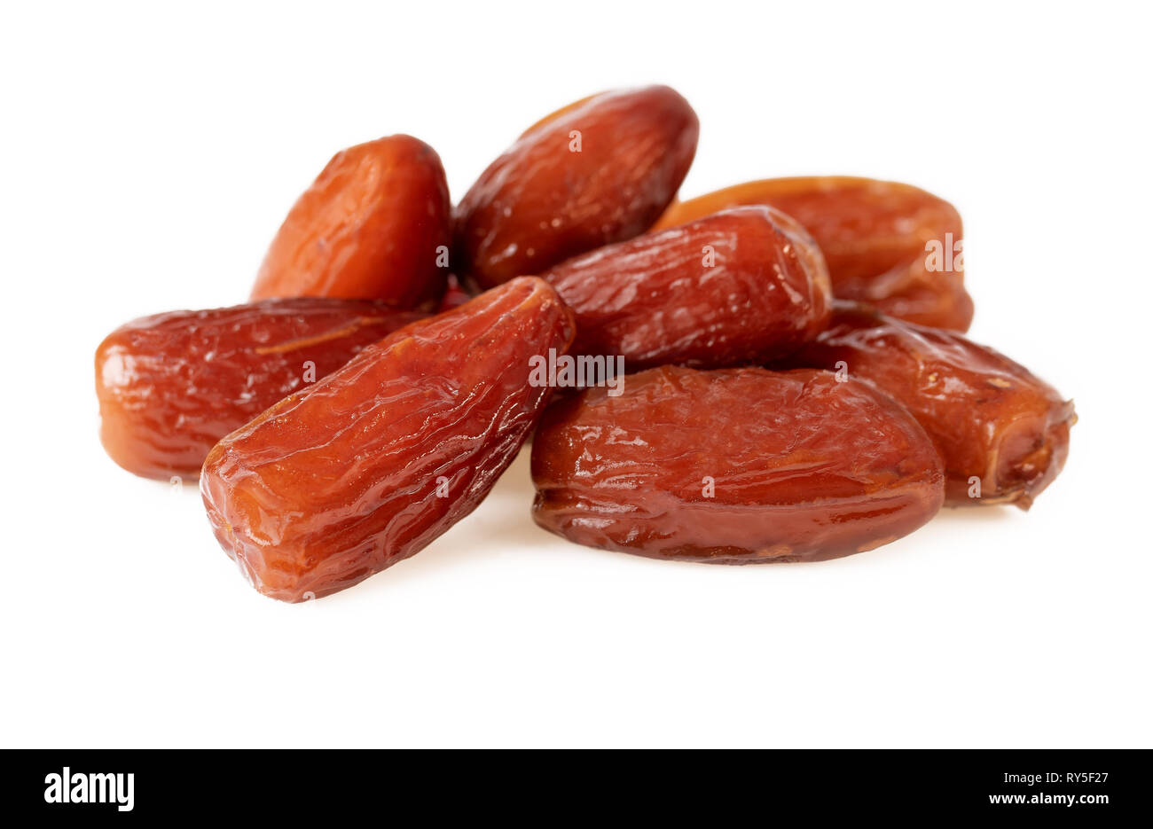 Dates Fruit. Pile of Dried Dates On White Stock Photo