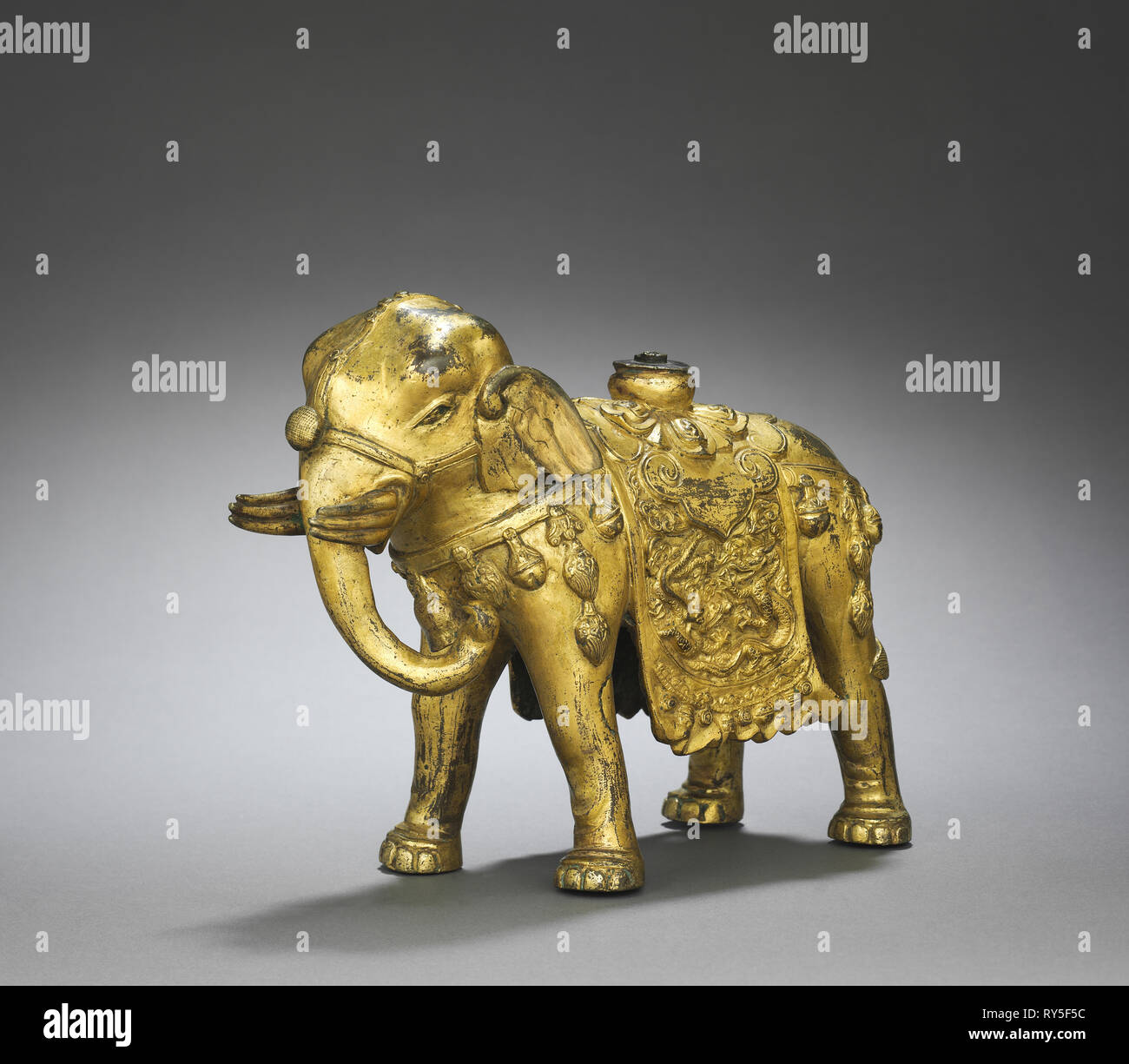 Caparisoned Elephant, c. 1000s. China, Liao dynasty (916-1125). Gilt bronze; overall: 18.5 cm (7 5/16 in Stock Photo