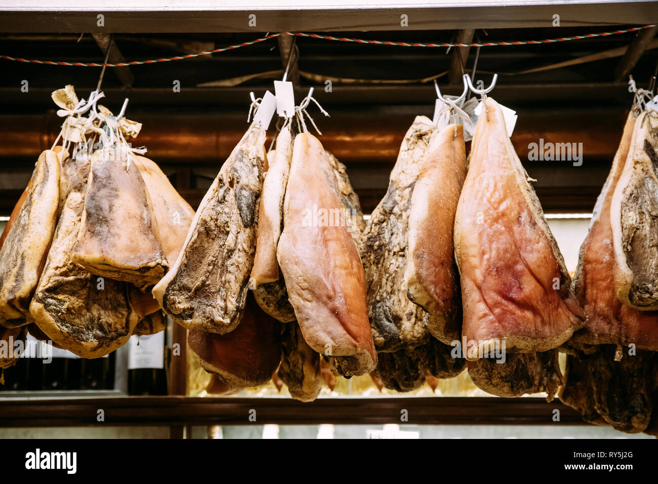Hanging Ham Or Gammon Meat In Shop Stock Photo - Alamy