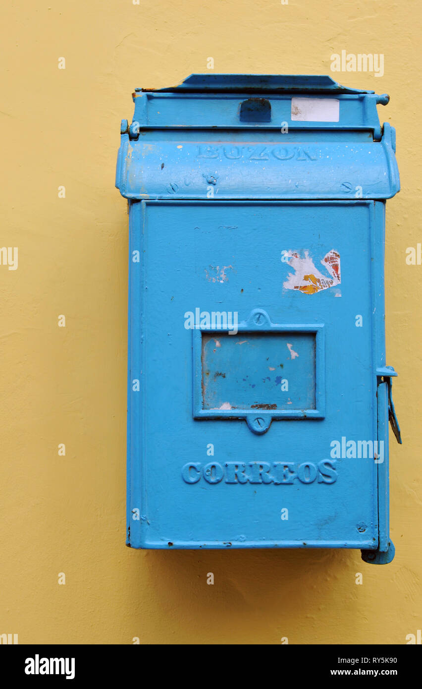 A mailbox for the Cuban postal service (Correos de Cuba) is affixed to the wall of a building in Old Havana. Stock Photo