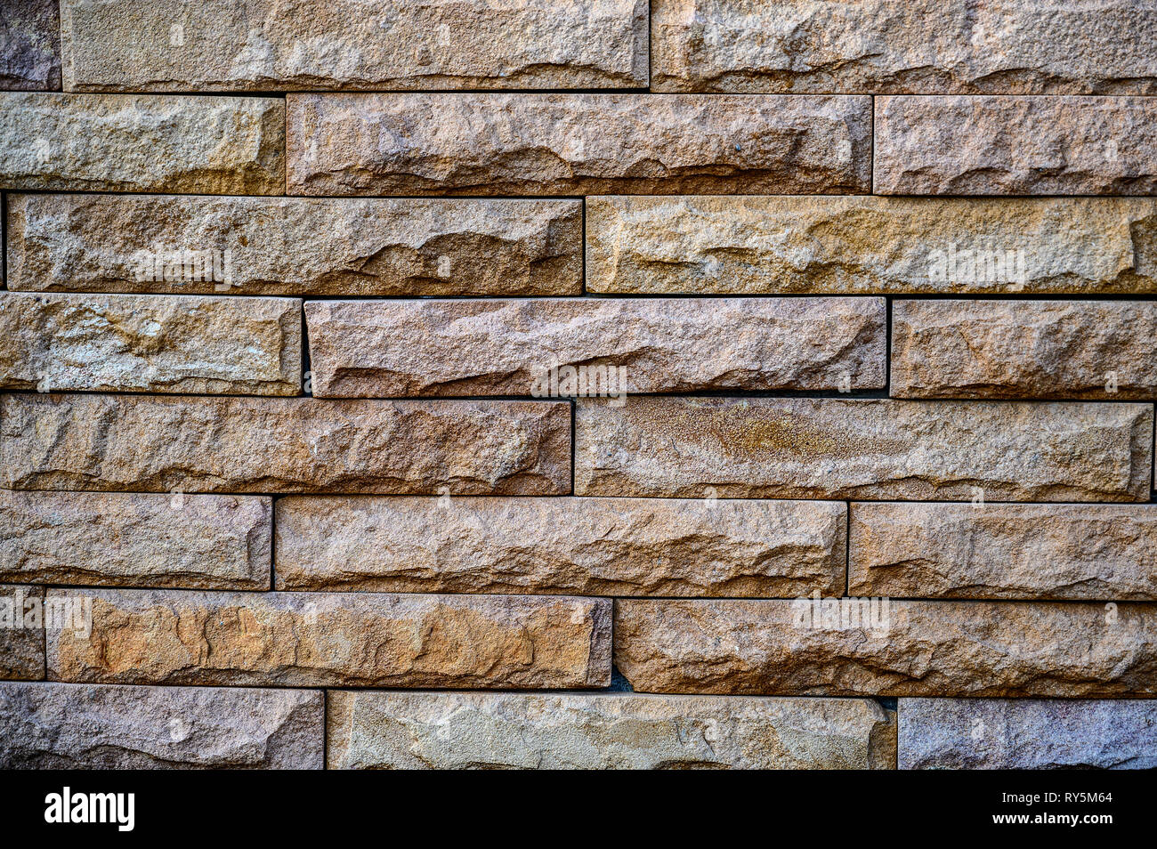 Old brown stone bricks wall pattern background of brick wall Stock ...
