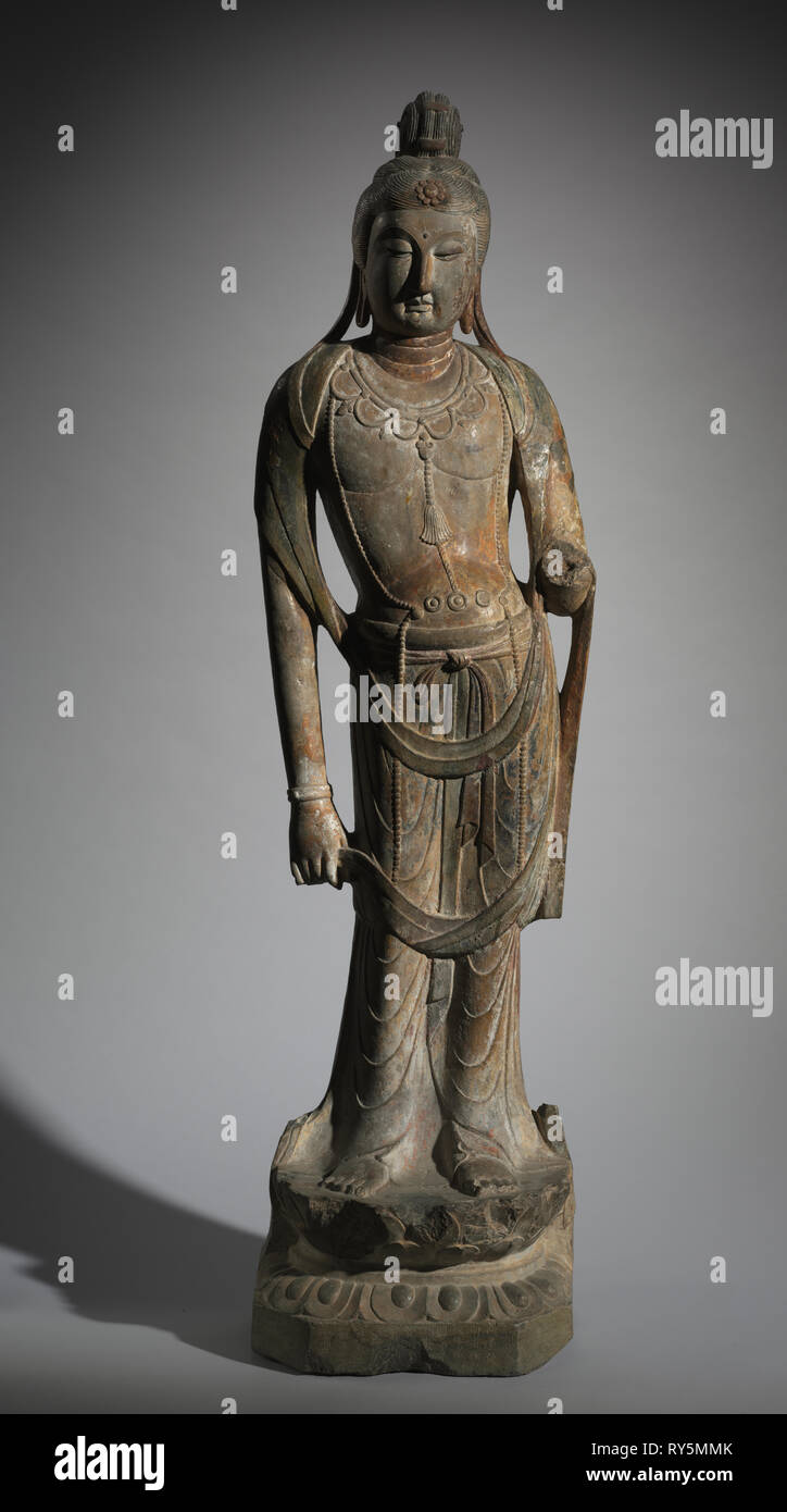 Standing Guanyin, 8th Century (?). China, Tang dynasty (618-907). Limestone; overall: 170.8 cm (67 1/4 in Stock Photo